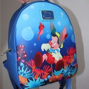 Disney/Loungefly Pinocchio Ocean Blue Mini Backpack with Colorful Coral Print